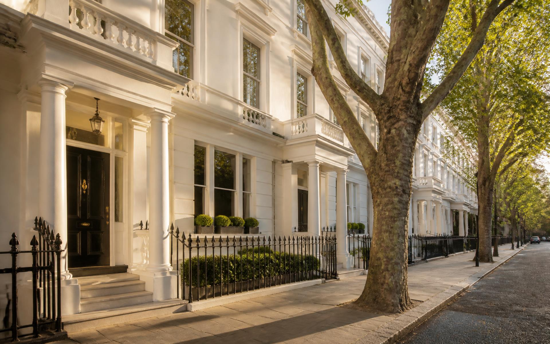 Well-presented period terrace houses on a quiet tree-lined London street
